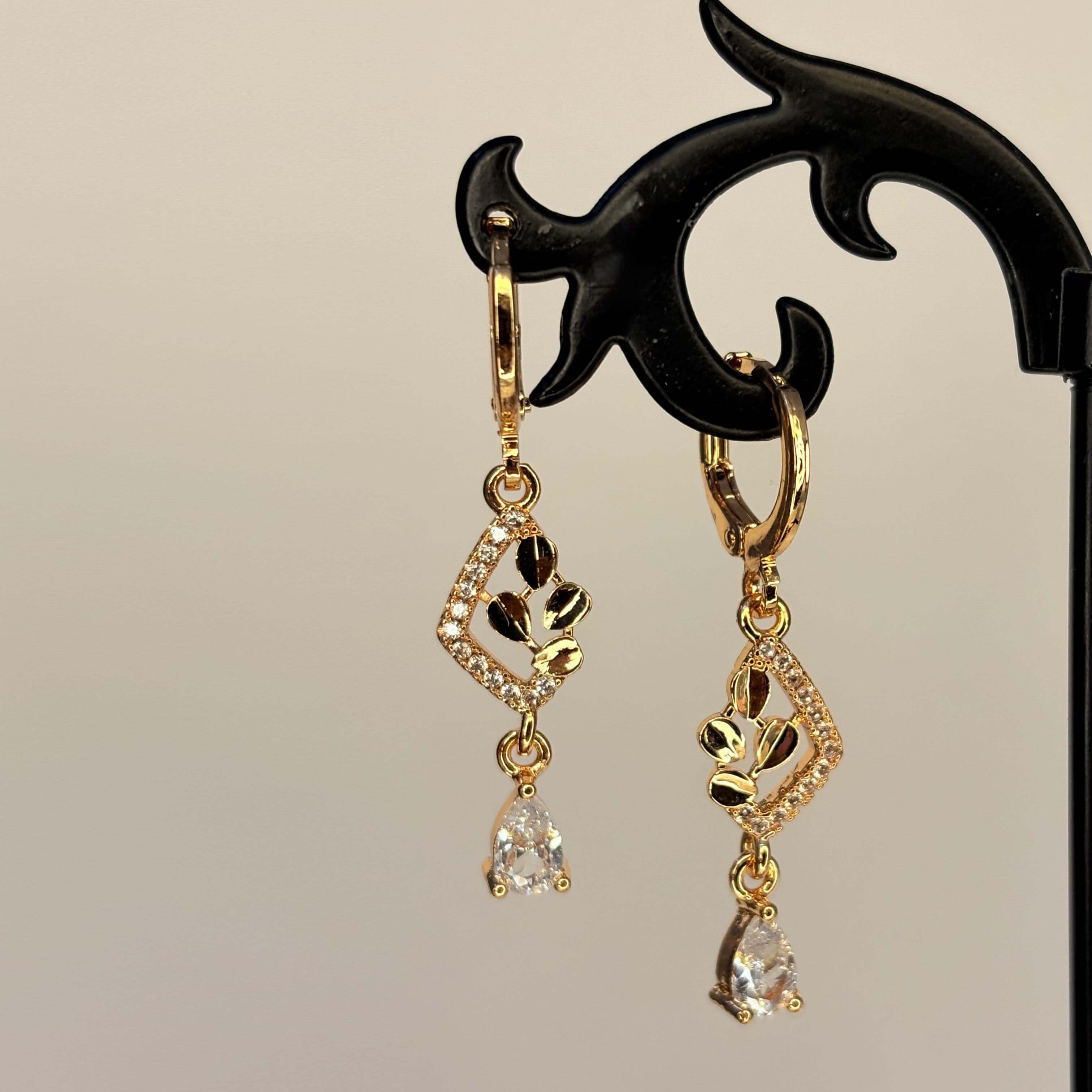 Golden AD Stone Drop Danglers